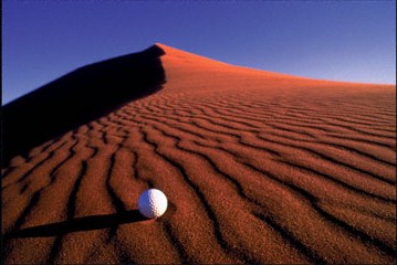 golf ball in sand